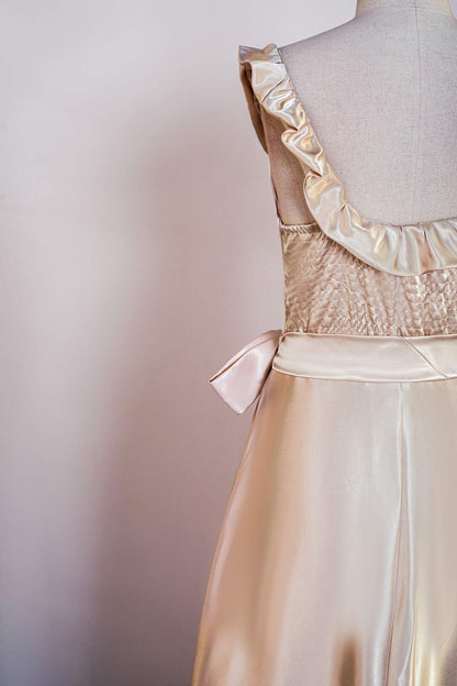 Champagne Ruffled Sleeveless Tea-Length Bridesmaid Dress with Sash