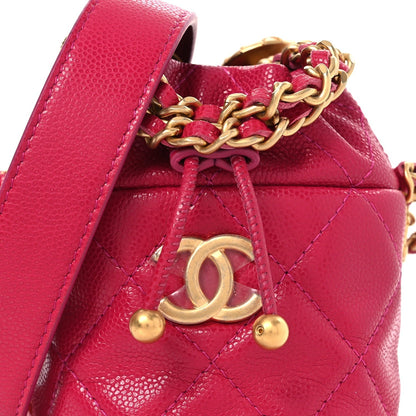Caviar Quilted Twist Your Buttons Mini Bucket Bag Fuchsia
