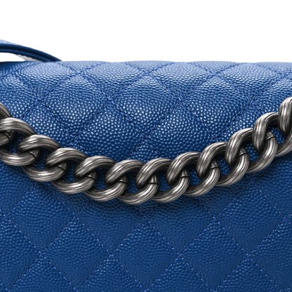 Caviar Quilted Medium Boy Flap Dark Blue