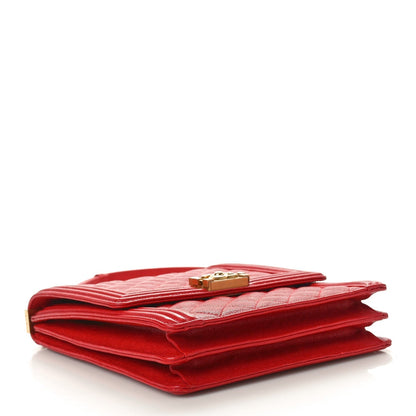 Caviar Quilted Maxi North South Boy Flap Red