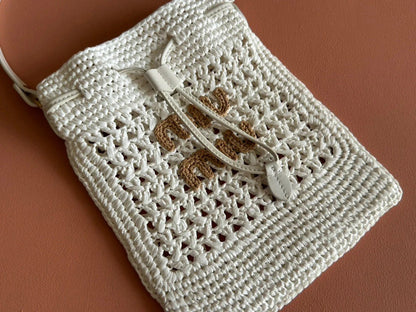 WANDER BUCKET BAG 23 WHITE IN RAFFIA WITH LEATHER TRIM